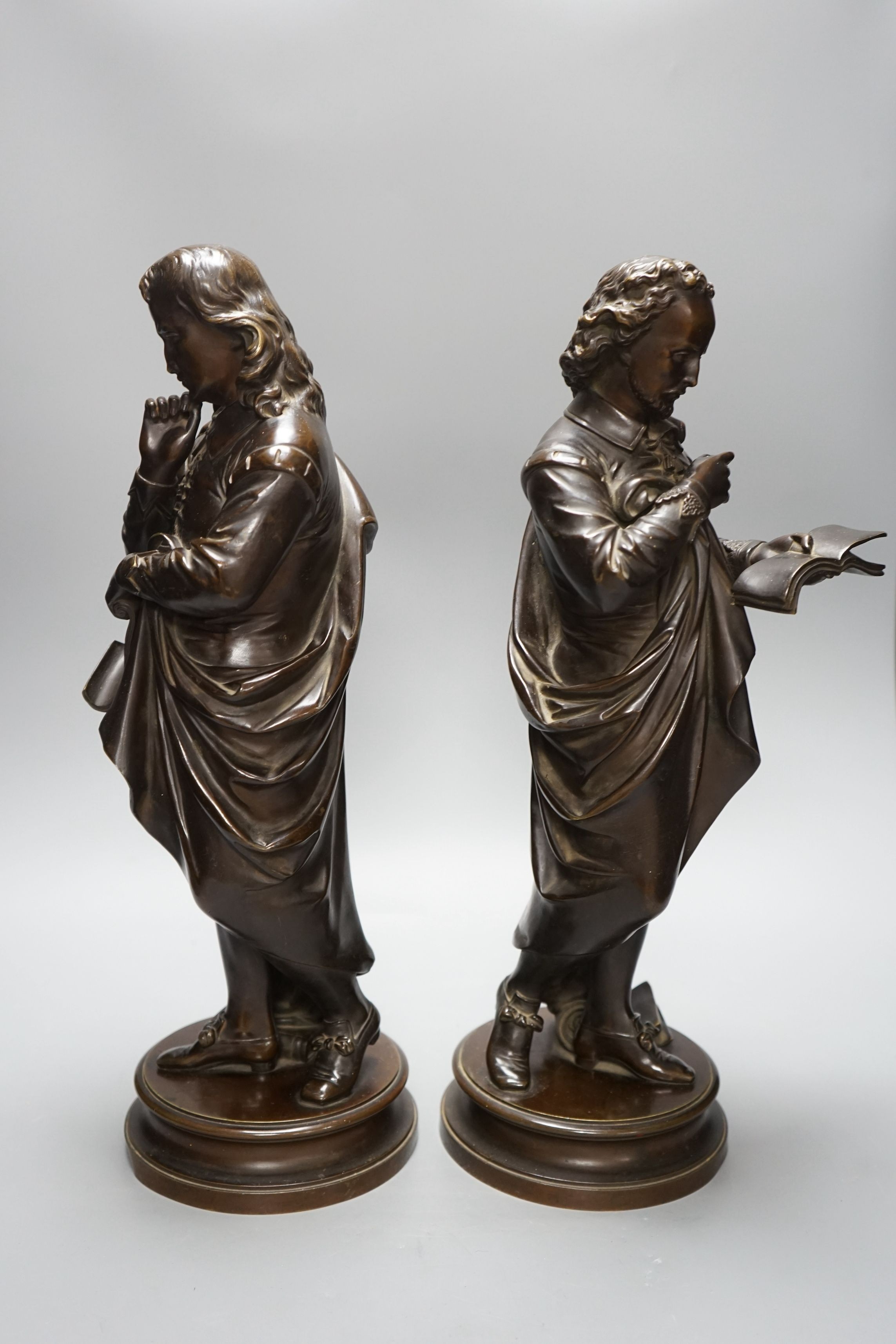 A pair of late 19th century French bronze figures of Shakespeare and Milton, tallest 44cms